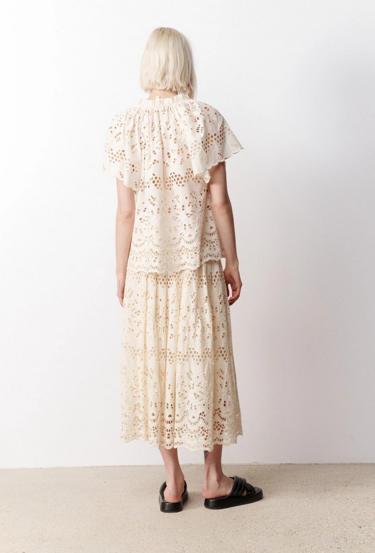 Tunic κεντημένη σε εκρού φωτογραφία