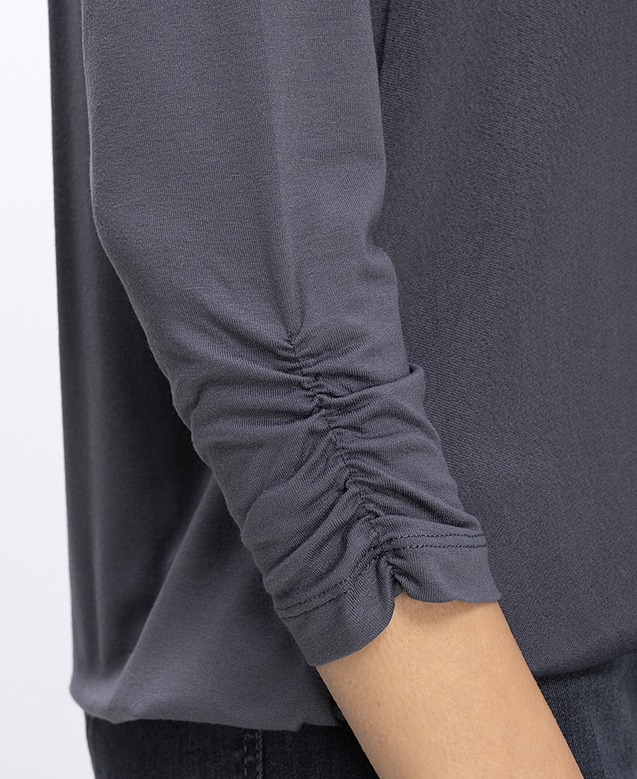 Γυναικεία Μπλούζα Με V Λαιμόκοψη Και Σούρα Στα Μανίκια φωτογραφία